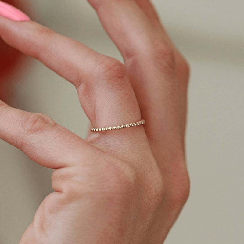 A small polka dot glossy design ladies' ring for a ring party.