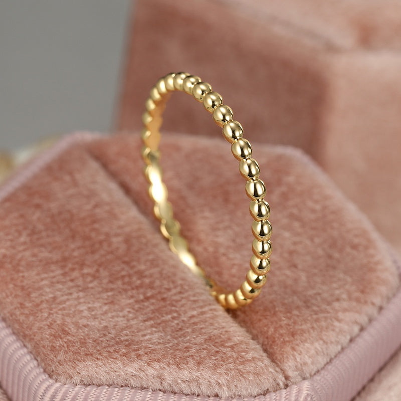 A small polka dot glossy design ladies' ring for a ring party.