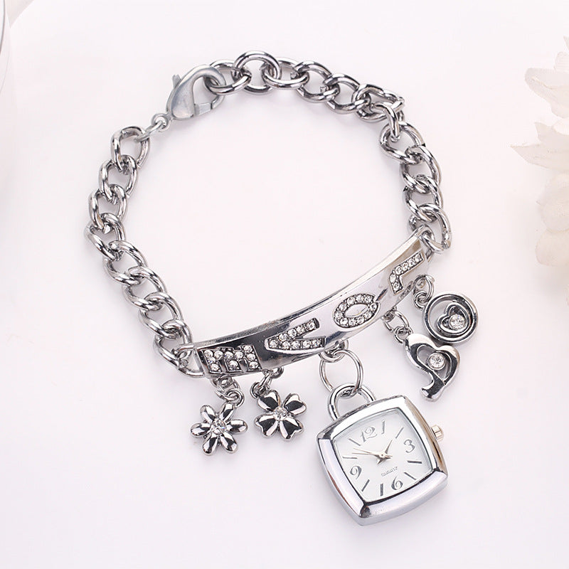 Exquisite LOVE Alphabet Bracelet Watch for Women - Quartz Movement with Flower Decor and Tonneau Dress Design - Perfect for Casual and Formal Occasions