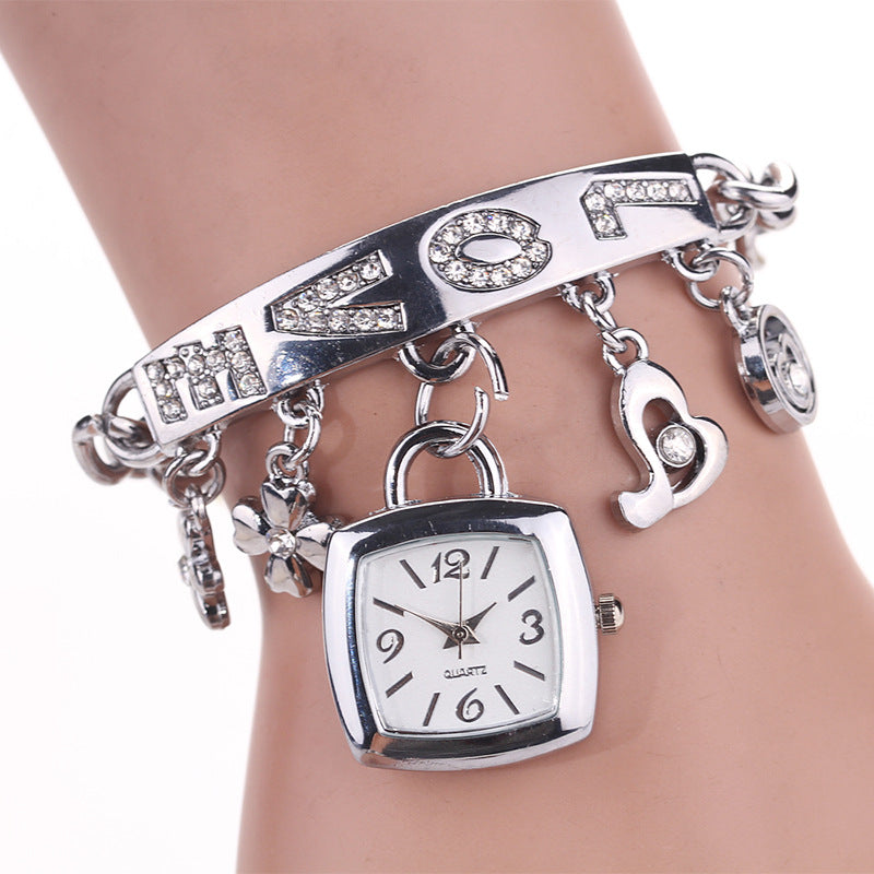 Exquisite LOVE Alphabet Bracelet Watch for Women - Quartz Movement with Flower Decor and Tonneau Dress Design - Perfect for Casual and Formal Occasions